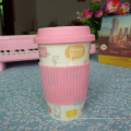 Customized bone china travel mug silicone lid and sleeve in different colour